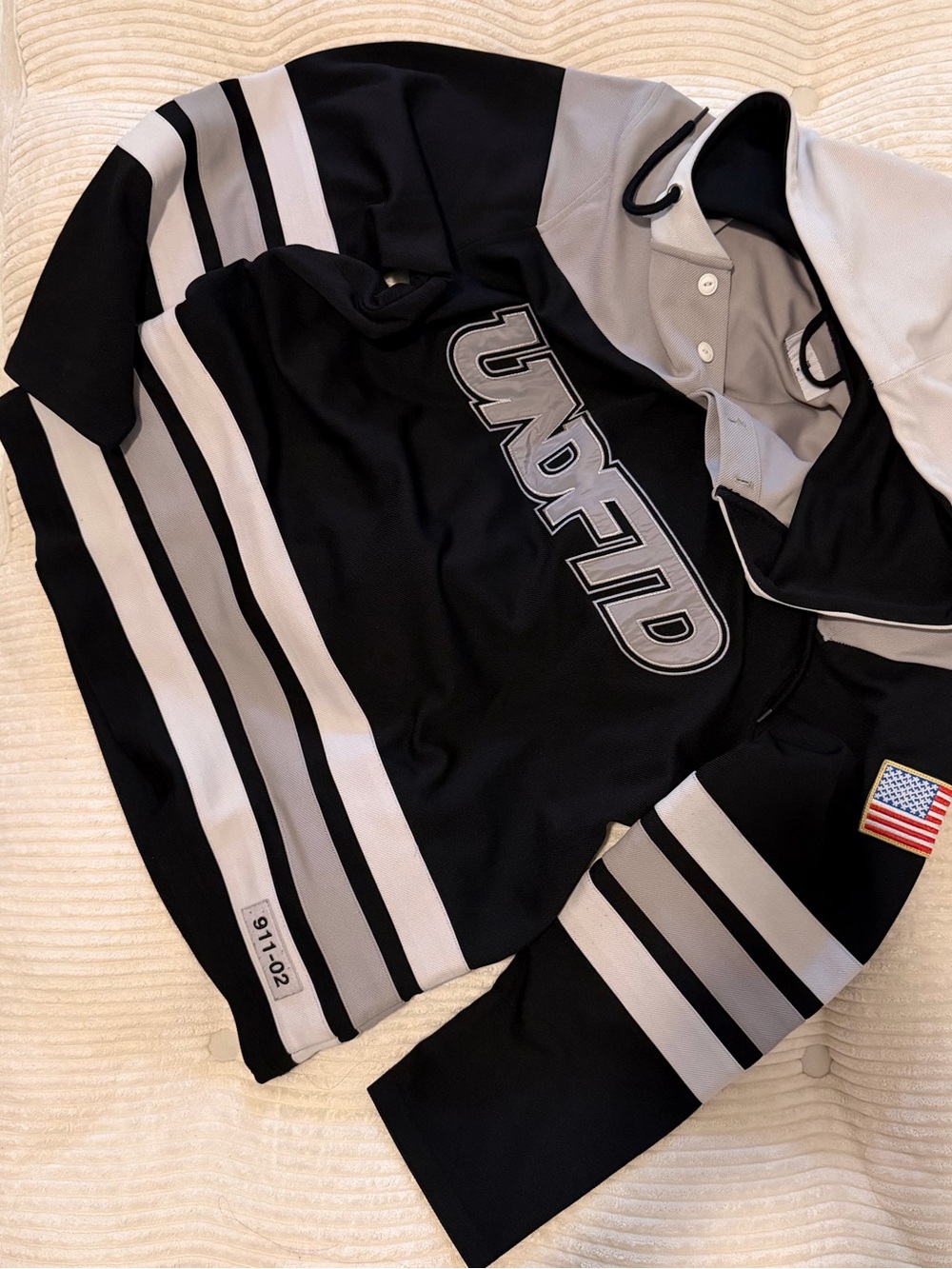 Undefeated Black and Gray Hockey Jersey with Stripes